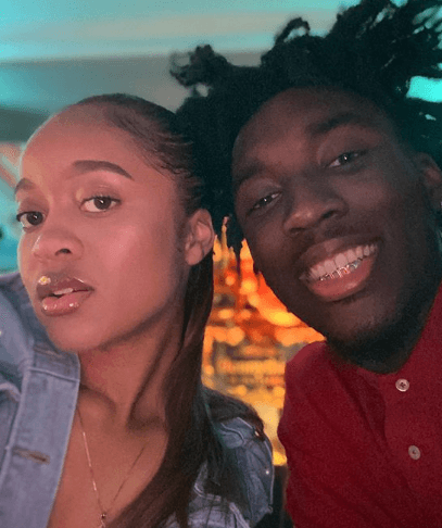 With His Gorgeous Girlfriend